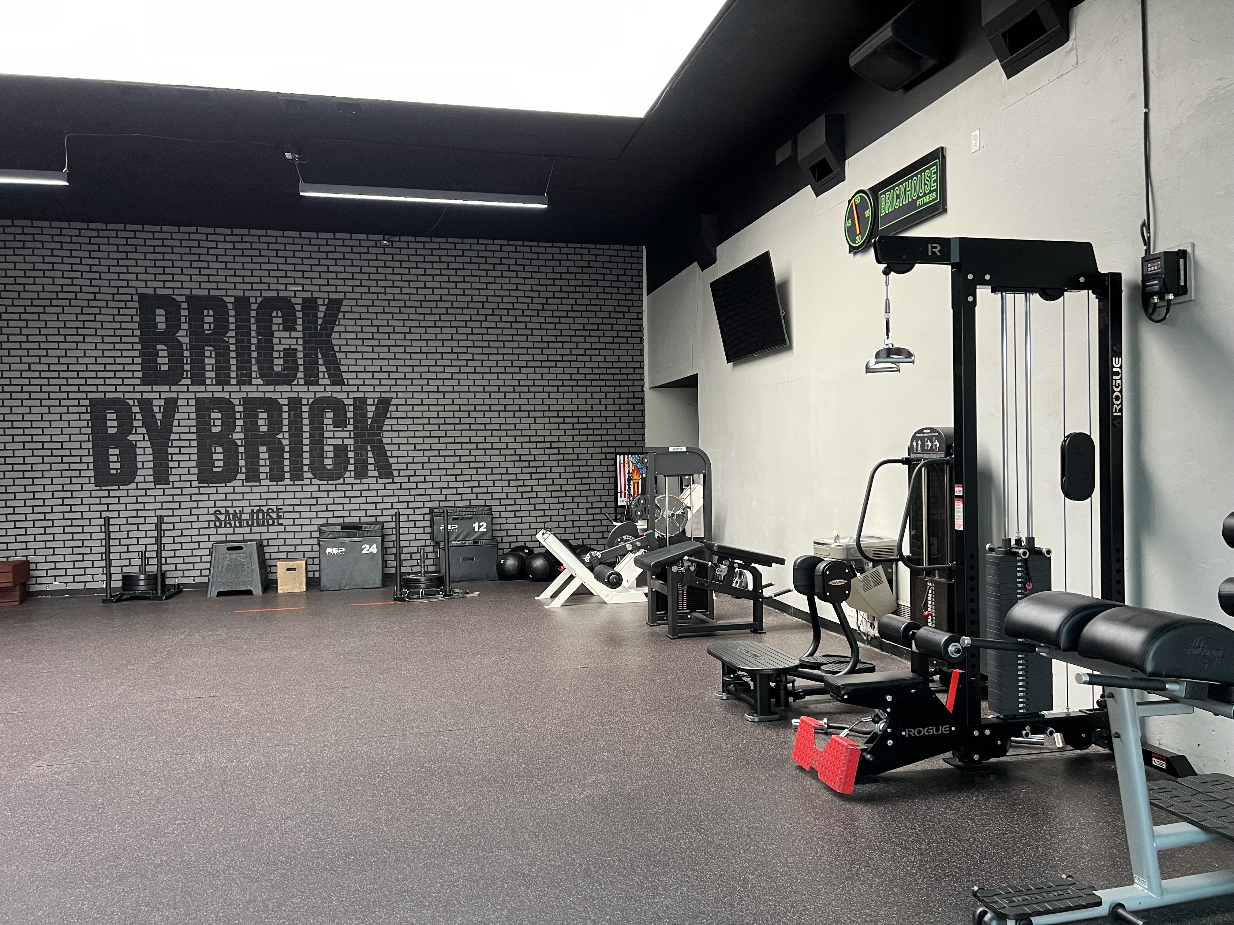 Brick House Fitness equipment wall